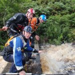 Photo of the Boluisce river in County Galway Ireland. Pictures of Irish whitewater kayaking and canoeing. Foot bridge  very high water in August 2008. Photo by Ross Lynch
