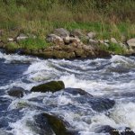Photo of the Suck river in County Roscommon Ireland. Pictures of Irish whitewater kayaking and canoeing. Close up of small wave on final drop. . Photo by Eoin Hurst